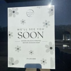The Tease MVMT - Signage on front door