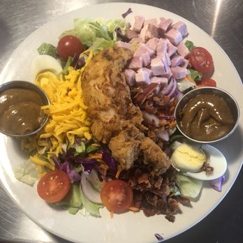 Rockys Hot Chicken Shack - Salad with thick balsamic vinegarette dressing - Sandwiches Near Me - Greenville, South Carolina Rockys Hot Chicken Shack - Salad with thick balsamic vinegarette dressing - Sandwiches Near Me - Greenville, South Carolina