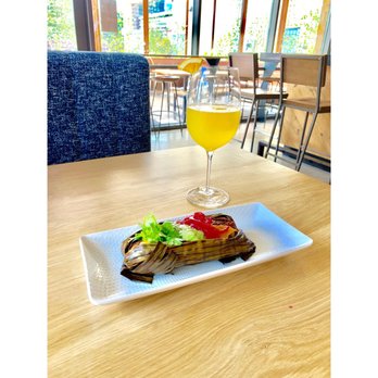 Mour Cocina | Bodega - Beef Brisket Tamal & mymosa - Wine Bars Near Me - Austin, Texas