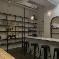 Cape Bottle Room - Cash register view from the center long bar table