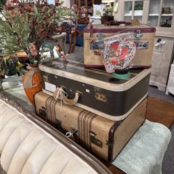 Bergan's Timeless Treasures - Vintage adorable suitcases. Love all the staging in this place.