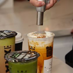 Krak Boba - Getting fancy our King Brulee, torching the dark brown sugar over our sea cream. Then we finish with a sprinkle of pure cocoa powder. Yes!