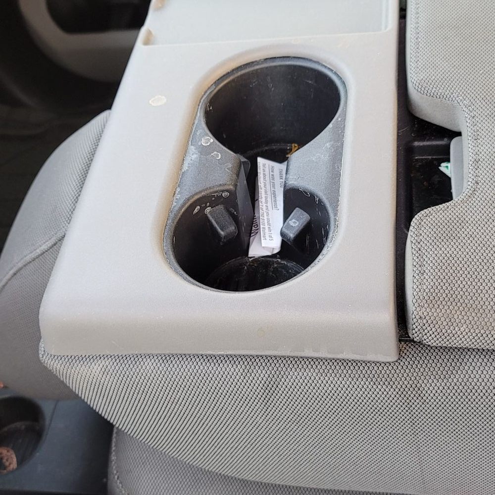 Grapevine Ford Service Center - Trash in the coffee holder. - Auto Repair Near Me - Grapevine, Texas Grapevine Ford Service Center - Trash in the coffee holder. - Auto Repair Near Me - Grapevine, Texas