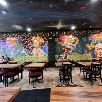 Orale Cafe - The side wall has beautiful murals - Coffee & Tea Near Me - Round Lake, Illinois