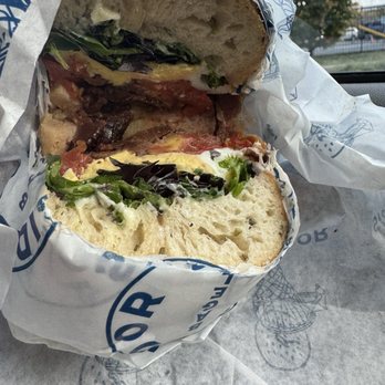 Sidedoor Bagel - BLT on a rosemary and slat bagel with an egg added. - Bagels Near Me - Indianapolis, Indiana Sidedoor Bagel - BLT on a rosemary and slat bagel with an egg added. - Bagels Near Me - Indianapolis, Indiana