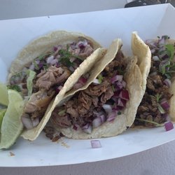 Poco Loco special taco, Birria taco, carnitas taco.