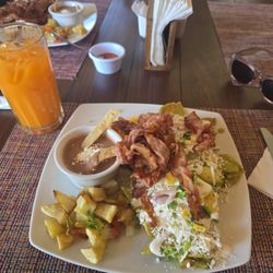 El Andador Café - Chilaquiles Poblanos with bacon and eggs