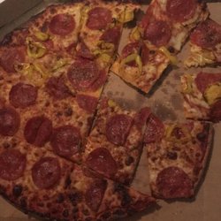 Domino's Pizza - Spend your money somewhere else. They delivered it super late, and on top of that just butchered the poor pizza.