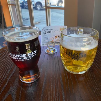 Orange Hat Brewing - two glasses of beer on a table - Breweries Near Me - Knoxville, Tennessee