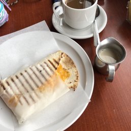 Coffee, soy milk, tuna melt wrap (great taste despite eating the paper)