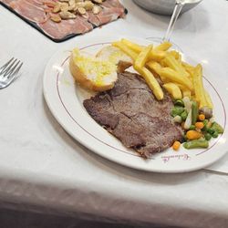 Columbus - Jamon and Almonds and. Veal steak.