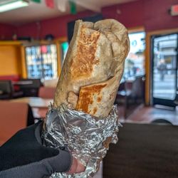 El Farolito - Super burrito carnitas, dorados style.