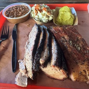 Terry Black's Barbecue - Brisket and pork ribs with sides of pinto beans and potato salad. Everything was excellent!! - Barbeque Near Me - Austin, Texas Terry Black's Barbecue - Brisket and pork ribs with sides of pinto beans and potato salad. Everything was excellent!! - Barbeque Near Me - Austin, Texas