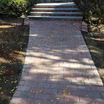 TJ Sullivan Landscaping - a brick walkway leading to a front door - Landscaping Near Me - Belmont, Massachusetts TJ Sullivan Landscaping - a brick walkway leading to a front door - Landscaping Near Me - Belmont, Massachusetts