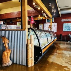 Fisherman's Market & Grill - Part of the dining area and fish counter.