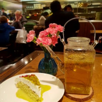 L'Eto Caffe - Camomile tea served in transparent jug and a slice of the heavenly pistachio dulce de leche. Ends the day perfectly. - Cafes Near Me - London, XGL L'Eto Caffe - Camomile tea served in transparent jug and a slice of the heavenly pistachio dulce de leche. Ends the day perfectly. - Cafes Near Me - London, XGL