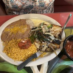 Pepe's Mexican Restaurant - Chicken covered with poblano pepper and onions