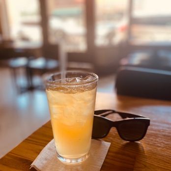 The Diplomat Eatery and Tavern - a glass of orange juice and sunglasses - Mediterranean Near Me - Monrovia, California The Diplomat Eatery and Tavern - a glass of orange juice and sunglasses - Mediterranean Near Me - Monrovia, California