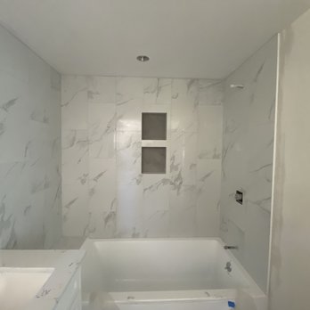 Leons Construction - New Construction porcelain bathroom - Masonry/Concrete Near Me