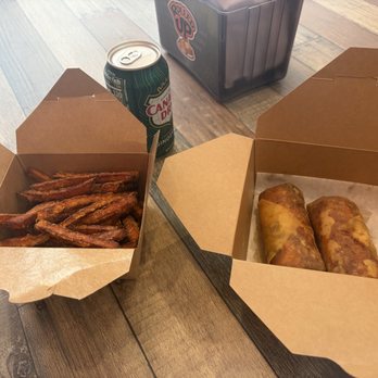 Rolled UP - Philly cheesesteak and chicken parm roll with a side of sweet potato fries. - Cheesesteaks Near Me - Norfolk, Virginia Rolled UP - Philly cheesesteak and chicken parm roll with a side of sweet potato fries. - Cheesesteaks Near Me - Norfolk, Virginia