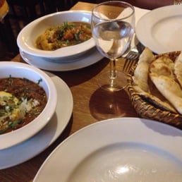 Chana masala (left), mix vegetable (right) and naan Chana masala (left), mix vegetable (right) and naan