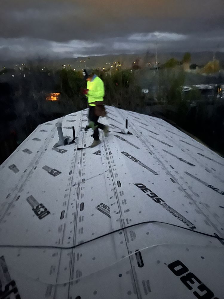 Slide of Israel Professional Roofer