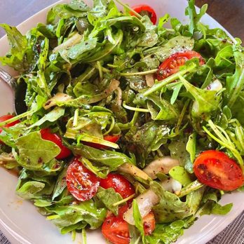 Laila - Arugula Salad: arugula, tomatoes, onions,lemon and olive oil. Arugula Salad - Mediterranean Near Me - Staten Island, New York Laila - Arugula Salad: arugula, tomatoes, onions,lemon and olive oil. Arugula Salad - Mediterranean Near Me - Staten Island, New York