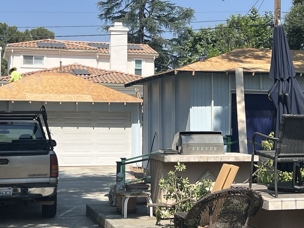 Slide of Musulman Roofing