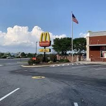 McDonald's - empty parking lot with american flag - Burgers Near Me - Trexlertown, Pennsylvania McDonald's - empty parking lot with american flag - Burgers Near Me - Trexlertown, Pennsylvania