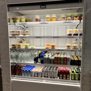 Bare Naked Kitchen - Grab and go section. They were out of a lot when we were there. - Pizza Near Me - Tampa, Florida