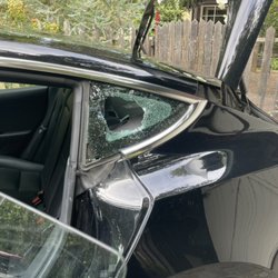 Big K Auto Glass - 2019 Tesla 3, driver side quarter repair with white chrome.