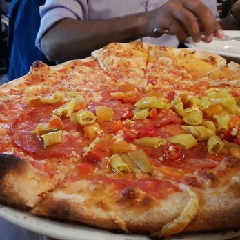 Il Pescatore - This pizza was so good,  I could eat another at any time!  Crust was super light and crispy and toppings delicious. - Italian Near Me - Füssen, BY