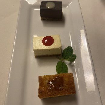 El Gaucho - Bellevue - Dessert trio; Chocolate ganache, cheese cake, and bread pudding. - Steakhouses Near Me - Bellevue, Washington El Gaucho - Bellevue - Dessert trio; Chocolate ganache, cheese cake, and bread pudding. - Steakhouses Near Me - Bellevue, Washington