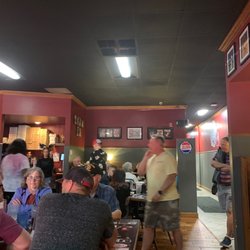 Baker's Pizza Sports Shack - Lots of tables on this side and high tops on the other.