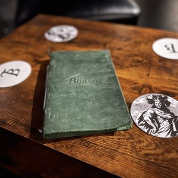 The Bunker Mixology - a green book on a wooden table - Cocktail Bars Near Me - San Antonio, Texas The Bunker Mixology - a green book on a wooden table - Cocktail Bars Near Me - San Antonio, Texas