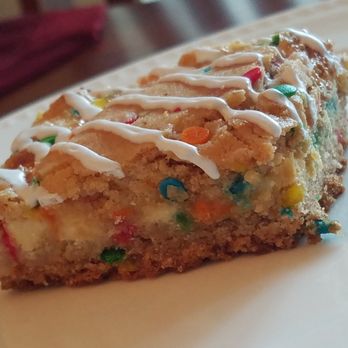 Sweet Relief - a slice of cake on a plate - Bakeries Near Me Sweet Relief - a slice of cake on a plate - Bakeries Near Me
