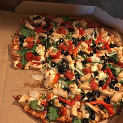 Domino's Pizza - This is how my pizza looked when I opened the box...a piece was missing.