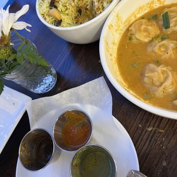 Himalayan Cuisine - Chicken Haandi Biryani (top), Chicken Jhol Momo (right) - Himalayan/Nepalese Near Me - Glenwood Springs, Colorado