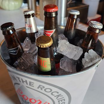 Happy Hour Sports Bar - a bucket of beer bottles - Sports Bars Near Me - Waterloo, Illinois Happy Hour Sports Bar - a bucket of beer bottles - Sports Bars Near Me - Waterloo, Illinois