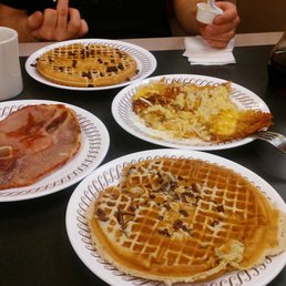 Pecan waffle, country ham, scattered, smothered and covered hashbrowns and chocolate chip waffle. Yes, my hubby is flipping me off. Pecan waffle, country ham, scattered, smothered and covered hashbrowns and chocolate chip waffle. Yes, my hubby is flipping me off.