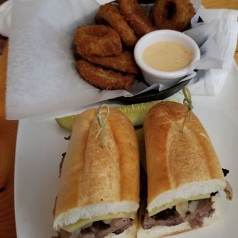 The Cue Restaurant - Brisket sandwich with onion rings - Barbeque Near Me - Danbury, Connecticut The Cue Restaurant - Brisket sandwich with onion rings - Barbeque Near Me - Danbury, Connecticut