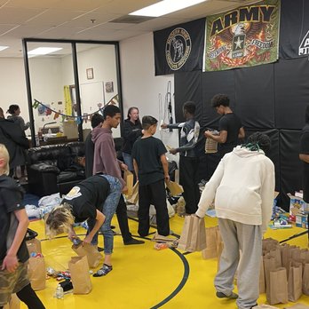 Assassin Grappling Academy - Kids making food/hygiene bags for the homeless - Kickboxing Near Me - Las Vegas, Nevada Assassin Grappling Academy - Kids making food/hygiene bags for the homeless - Kickboxing Near Me - Las Vegas, Nevada