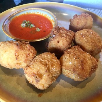 Curio Bistro - Grit Tots - Cajun/Creole Near Me - New Orleans, Louisiana Curio Bistro - Grit Tots - Cajun/Creole Near Me - New Orleans, Louisiana