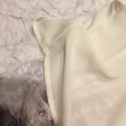 My originally white top. . . Now has a yellow tinge on the right. . . What happened to my top while it was at Maroney's ?!