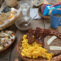Fresh fruit and granola, scrambled eggs, bacon and homemade salsa/tortillas Fresh fruit and granola, scrambled eggs, bacon and homemade salsa/tortillas