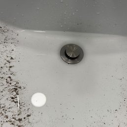 Clogged bathroom sink. Clogged bathroom sink.