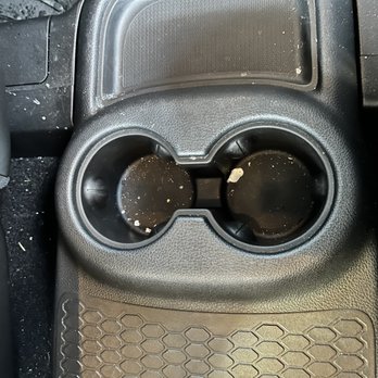 Bethpage Car Wash - Rear center console cup holders still filthy looks untouched - Car Wash Near Me - Bethpage, New York Bethpage Car Wash - Rear center console cup holders still filthy looks untouched - Car Wash Near Me - Bethpage, New York