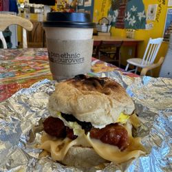 Panethnic Pourovers - Ube latte (small) and egg sandwich (w longanisa and seaweed on pandesal)
