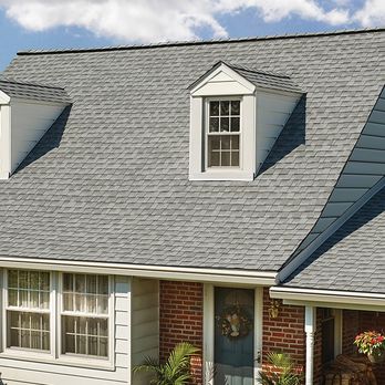 Price Contracting Solutions - a brick house with dorm windows - Roofing Near Me - Memphis, Tennessee Price Contracting Solutions - a brick house with dorm windows - Roofing Near Me - Memphis, Tennessee
