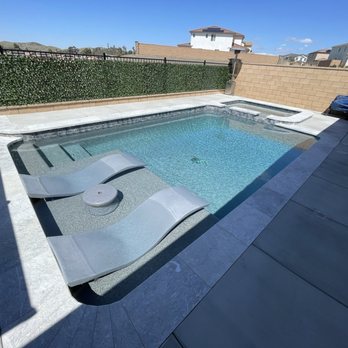 Cerda Pool Construction - New salt water pool and spa. Baja ledge, turtle mosaic, small waterfall and deck jet feature, designer fencing around pool equipment. - Pool & Hot Tub Service Near Me